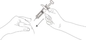 A hand holding a syringe with the