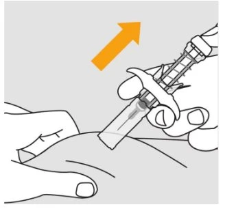 Hands holding a syringe at an angle while the