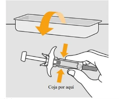 Medical illustration showing a hand holding a syringe with an orange arrow indicating the pulling action toward a container