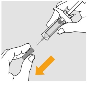 Two hands holding a syringe with the needle pointing downward and an orange arrow pointing downward in a medical technical drawing