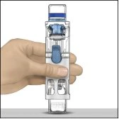 A hand holds vertically a transparent medical device with blue internal components and sliding mechanisms