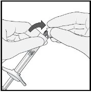 Two hands rotating the top part of a syringe to remove the cap, following the direction indicated by a black curved arrow