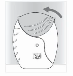 Technical drawing of a medical device with an upper lid being lifted to the left indicated by a curved arrow