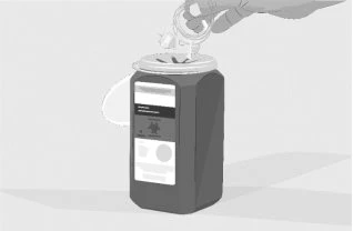A hand opens the cap of a dark cylindrical vial with a transparent medical device on a light neutral background