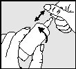 A hand holds a cylindrical medical device while administering it