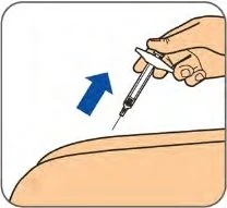 A hand holding a syringe with needle pointing toward the skin of a leg, with a blue arrow indicating downward movement