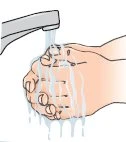 Two hands interlaced under a stream of water