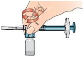 One hand rotates the syringe in a circular motion above a glass vial to aspirate the contents using the plunger