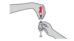 Two hands holding a syringe with a red arrow pointing toward the