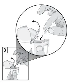 Mani che inseriscono una capsula in un dispositivo