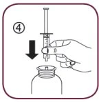 A hand holding a syringe with a