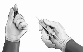 Two gloved hands holding a syringe with needle and a vial of medication, preparing for injection
