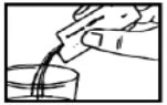 A hand holding an open sachet and pouring out granular or liquid contents
