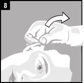 A hand gently lifts the skin of the face upward toward the