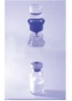Two transparent glass vials with rubber stoppers against a light purple background, the upper one containing a dark liquid and the lower one containing white powder