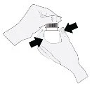 Two hands firmly pressing opposite ends of a medical vial, indicated by two black arrows pointing toward the center