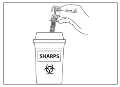 One hand inserts a needle with syringe into the