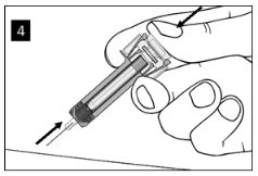 Two hands hold a syringe ready for