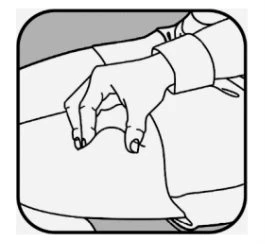 A hand pinching and lifting a skin fold on the upper arm to prepare for