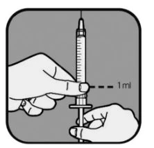 Two hands holding a vertical syringe with the