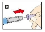A hand holding a protective cap to attach it to the tip of the device