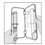 Technical drawing of a hand holding an injection pen at the