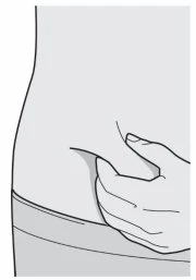 A hand pinching the skin of the abdomen