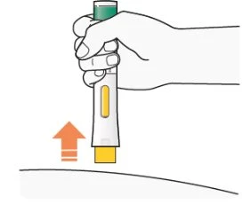 A hand holds a white and yellow cylindrical medical device above a curved surface with an orange arrow pointing toward