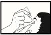 Black and white drawing showing a hand pouring drops from a bottle directly into the eye