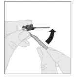 Two hands opening a medical device with a rotational motion indicated by a black curved arrow
