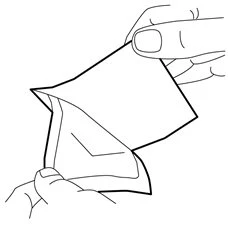 Two hands carefully opening a paper pouch or flat wrapper to remove the internal contents