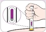 A hand holding a cylindrical medical device with an enlargement showing the level of a purple liquid inside