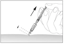 One hand holding a tilted syringe while the