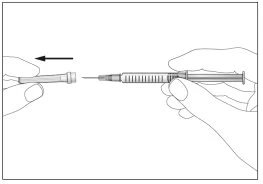 Two hands separating a needle from a syringe barrel, with a black arrow indicating a leftward movement for component detachment