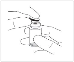 Two hands holding a glass vial with a dark cap for drug preparation in a black-and-white technical drawing