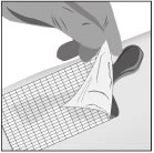 A hand lifts the
