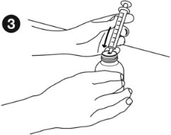 Two hands preparing medication, one holding a vial while the other