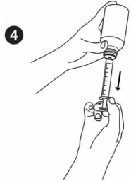 One hand holding an inverted vial while the other