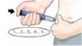 A hand holding an injection pen pressing it against the