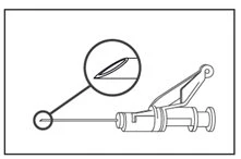 Technical diagram showing a thin needle attached to a medical device, with a circular magnified view of the sharp tip