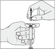 Two hands handling a syringe, one holding the body of the device while the other...