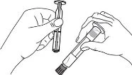 Two hands handling a glass vial and a needle-equipped syringe to prepare administration of a liquid medication