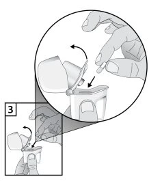 Hands inserting a capsule into a