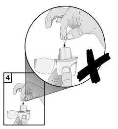 Black and white drawing showing a hand incorrectly removing the protective cap from a medical device with a black cross above