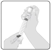 Two hands holding a graduated syringe to prepare the drug dosage