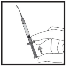A hand holds a tilted syringe with an arrow indicating thumb pressure on the plunger to expel liquid