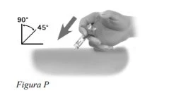 A hand holding a syringe by its barrel