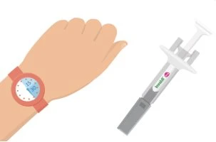 An arm with a digital watch on the wrist next to a syringe with needle and liquid inside