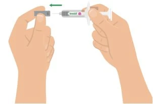 Two hands holding a pre-filled syringe and a grey disposal container, with a green arrow indicating the motion of inserting the syringe into the container