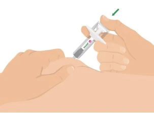 Two hands holding a pre-filled syringe to administer medication onto the skin of the arm, with a green arrow indicating the direction of pressure